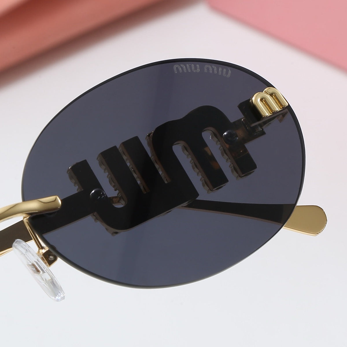 Miu Miu Oval Sunglasses (With Box)