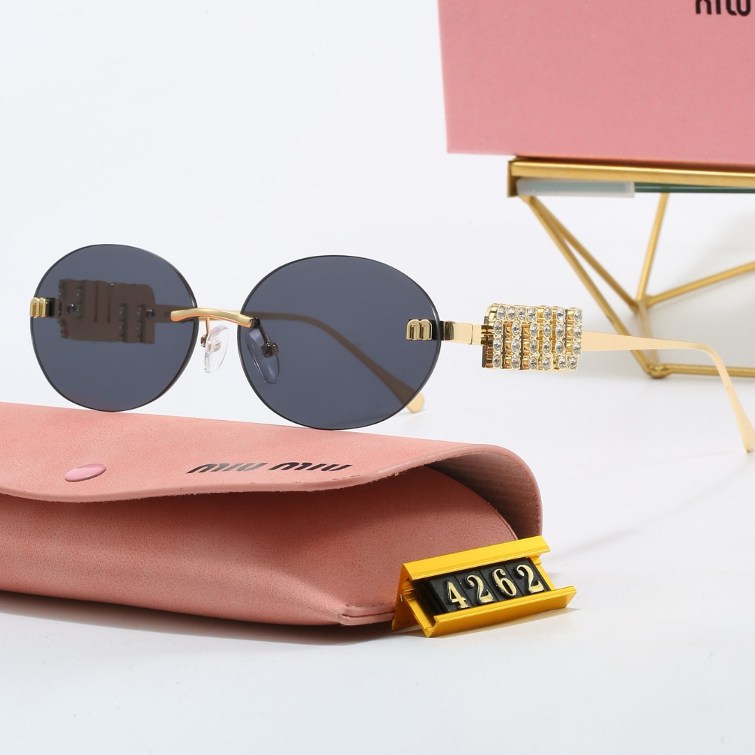 Miu Miu Oval Sunglasses (With Box)