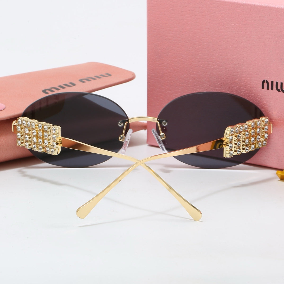 Miu Miu Oval Sunglasses (With Box)
